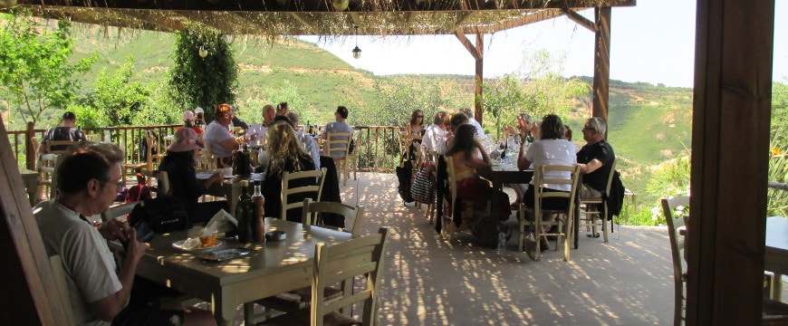 Botanical Park restaurant tables, with view in the background, Crete