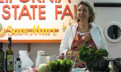 Alexandra Devarenne cooking at a California State Fair 