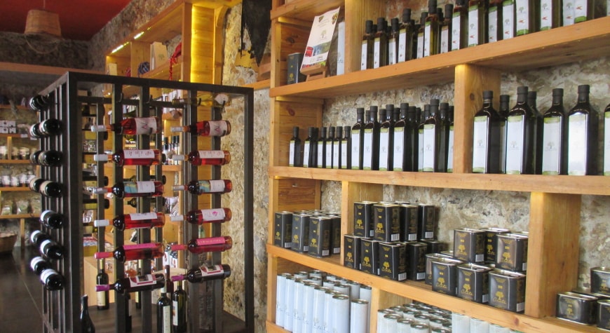 Creta Earth shop in Plakias, with olive oil and wine bottles displayed