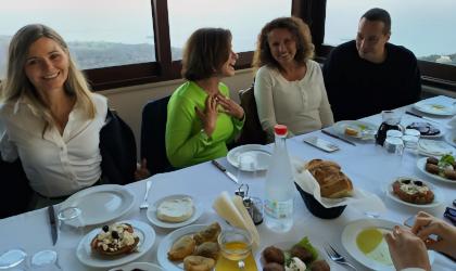 Cretan Lifestyle Conference participants enjoying a meal together