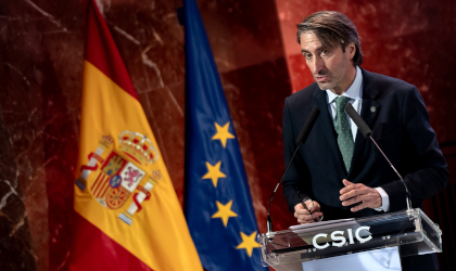 Jaime Lillo, Executive Director of the IOC, with Spanish and EU flags at his side